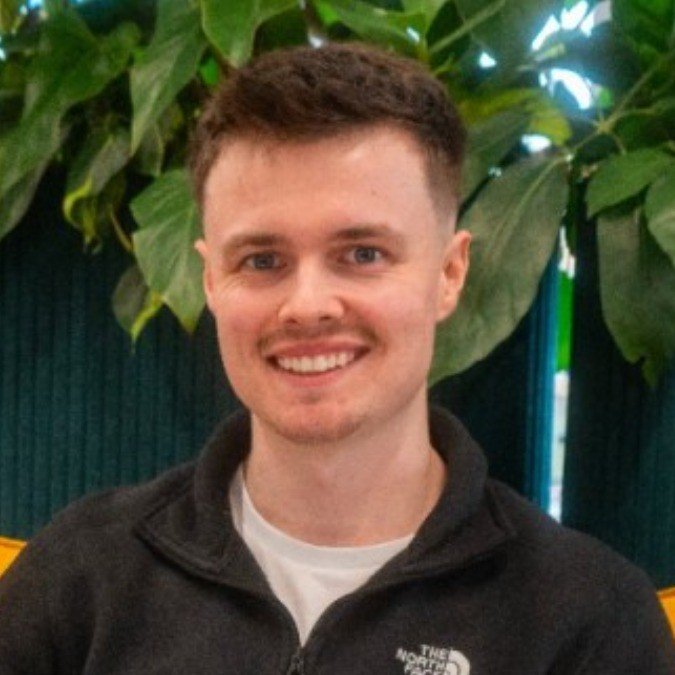 Sam mixing and mastering engineer smiling